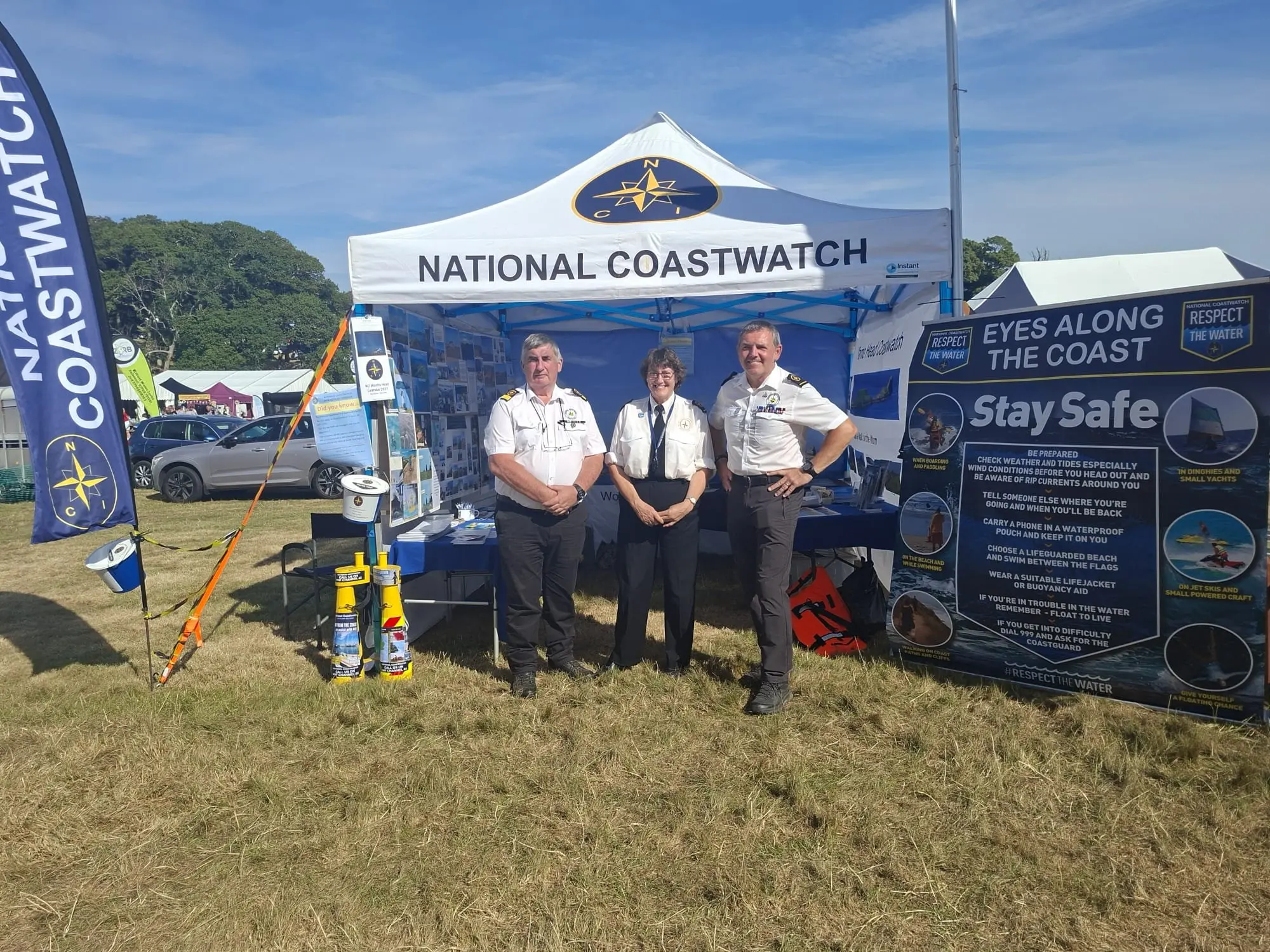 NCI Worms Head volunteers at the National Coastwatch 'Eyes Along the Coast' stand at a community event
