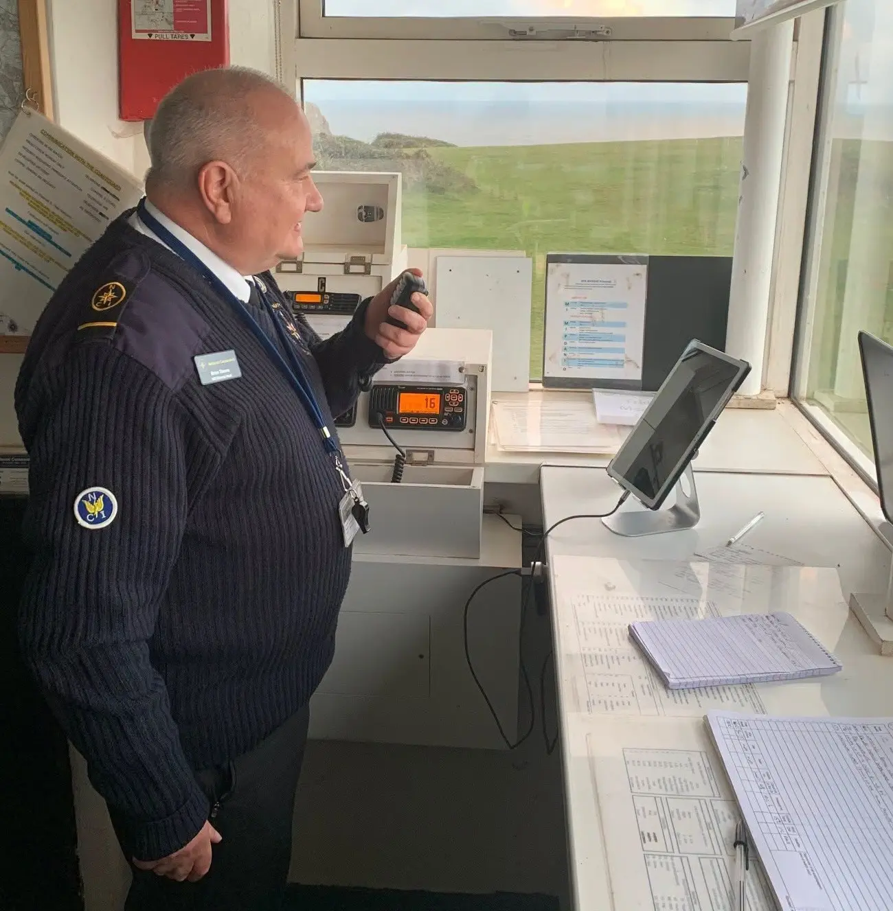 An NCI Worms Head watchkeeper on the VHF radio